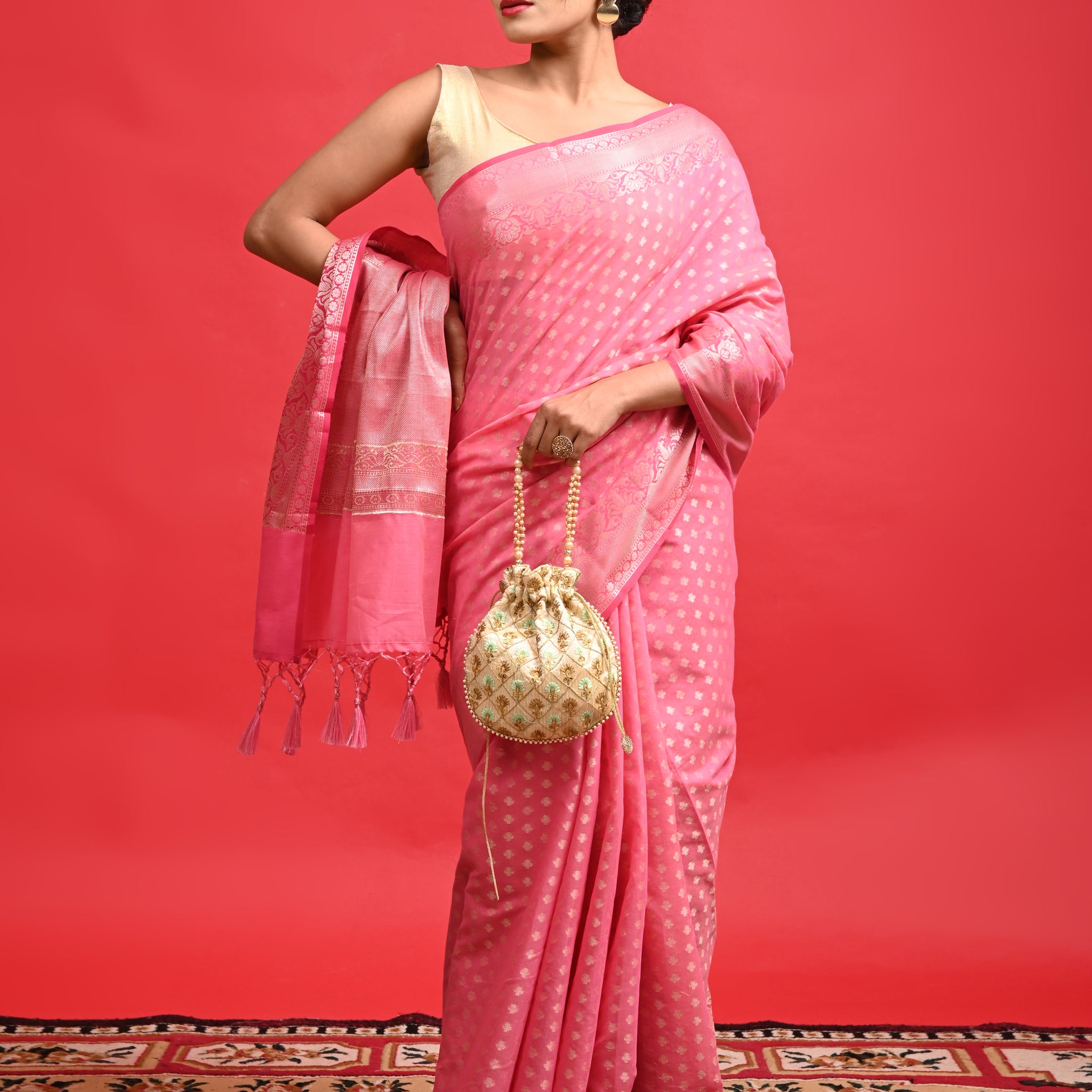 Pink Banarasi Saree with Floral Design and Tassels for Wedding Wear